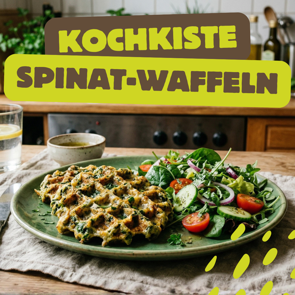 KI generiert: Spinat-Waffeln und Salat auf einem Teller in einer Küche.  
Text: "KOCHKISTE SPINAT-WAFFELN"